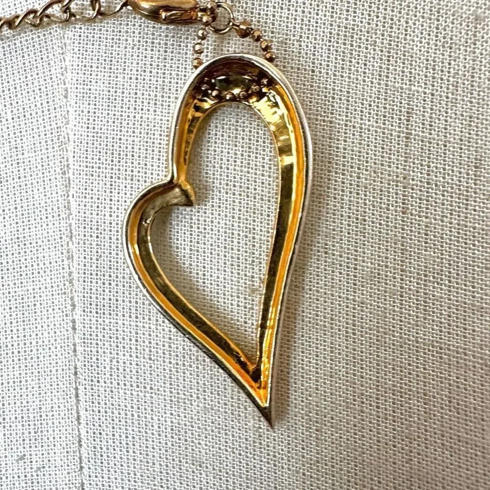 Gold tone open heart pendant necklace